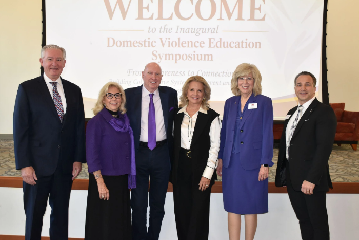 Domestic Violence Symposium Image with Kevin Steele, the Jordans, Tracy Davidson, President D'Emilio and Stephen Grieco 