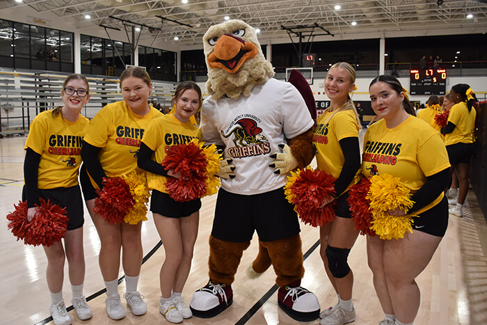 Cheerleaders at GMercyU's Griffin Madness event last October
